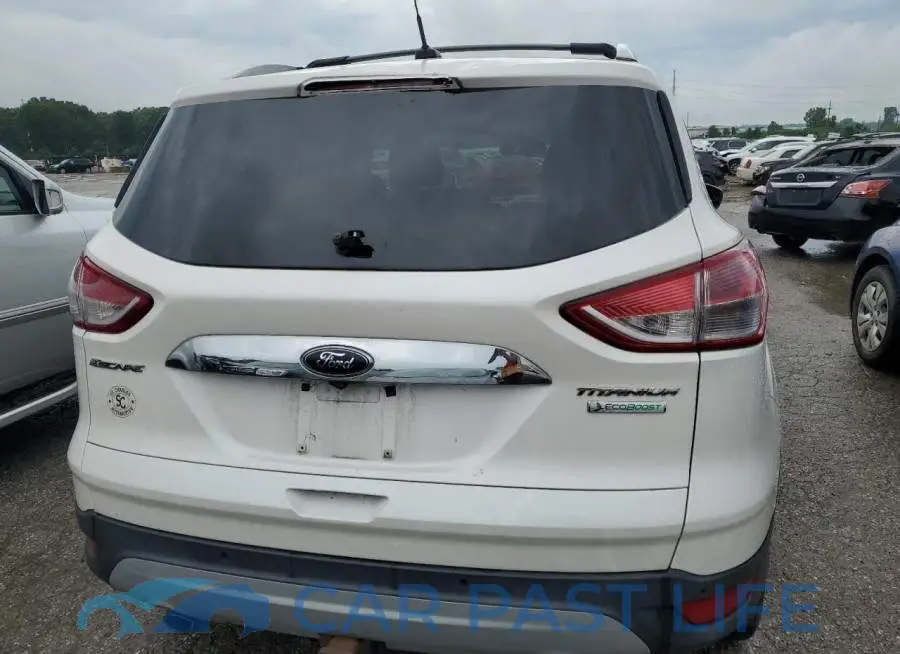 1FMCU0J97EUA05058# 6
