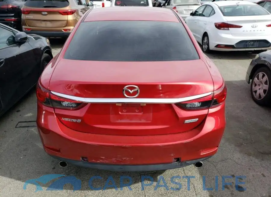JM1GJ1V60E1144129# 6