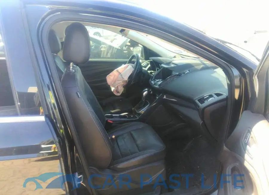 1FMCU0J90EUA37852# 5