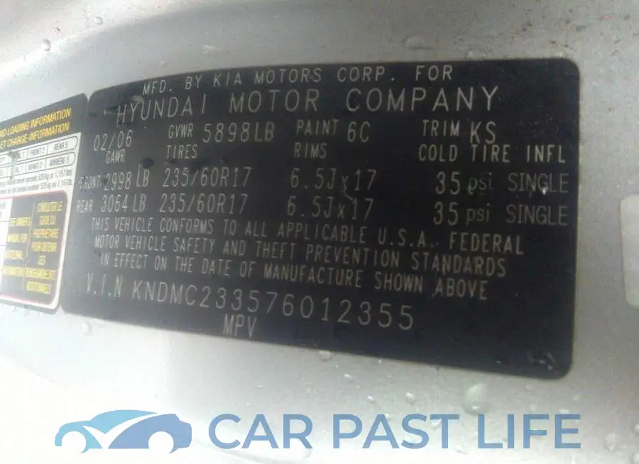 KNDMC233576012355# 9