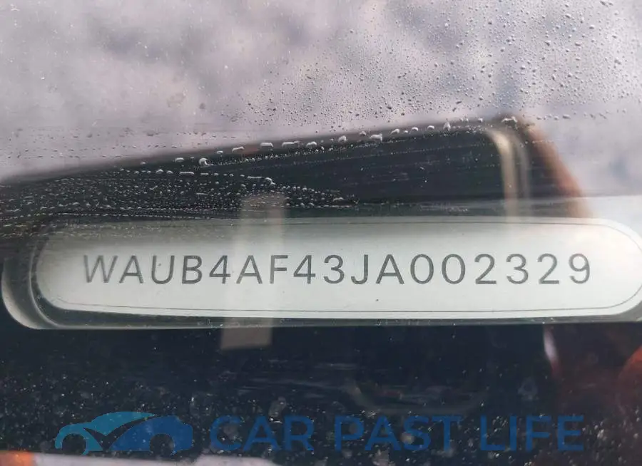 WAUB4AF43JA002329# 9