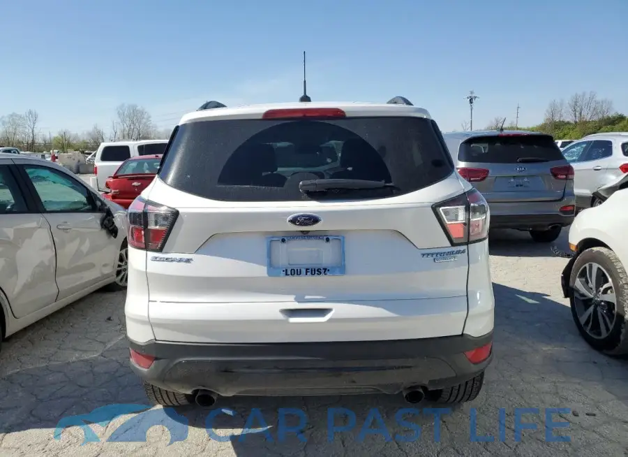1FMCU0J9XHUA81409# 6