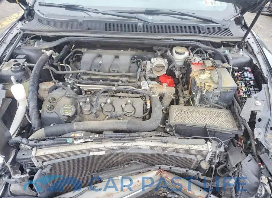 1FAHP2MK3JG104390# 11
