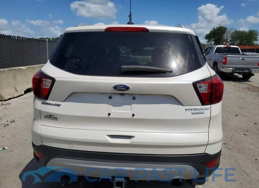 1FMCU0J93KUA30289# 6