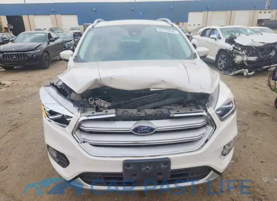 1FMCU0J95KUB55598# 5