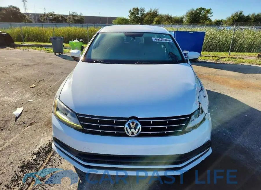3VW2B7AJ2JM261242# 5