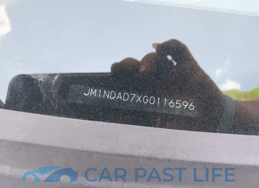 JM1NDAD7XG0116596# 9