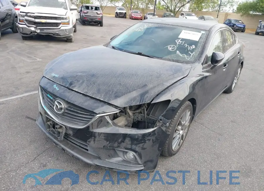 JM1GJ1V60E1121899# 2