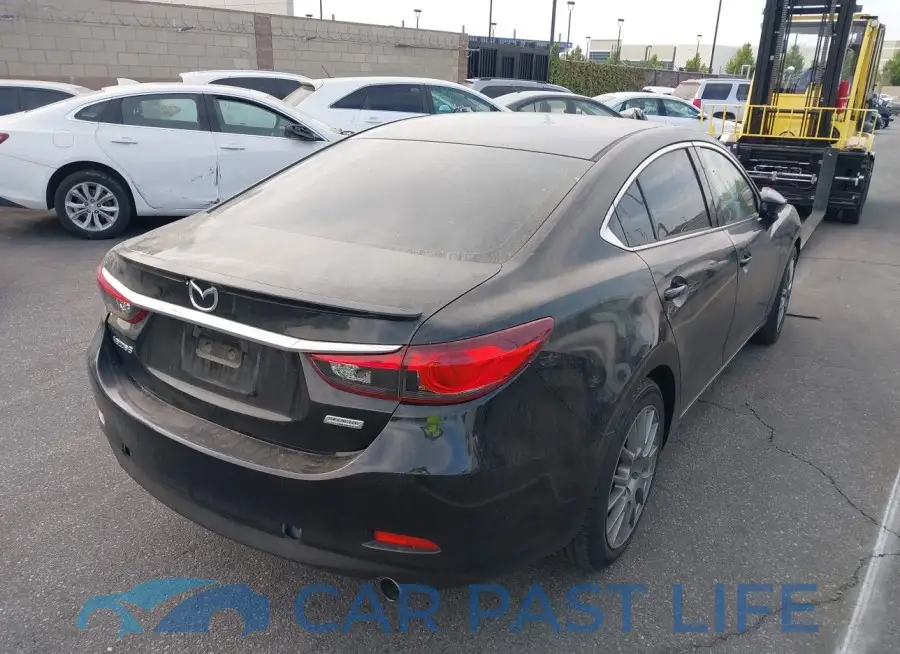 JM1GJ1V60E1121899# 4