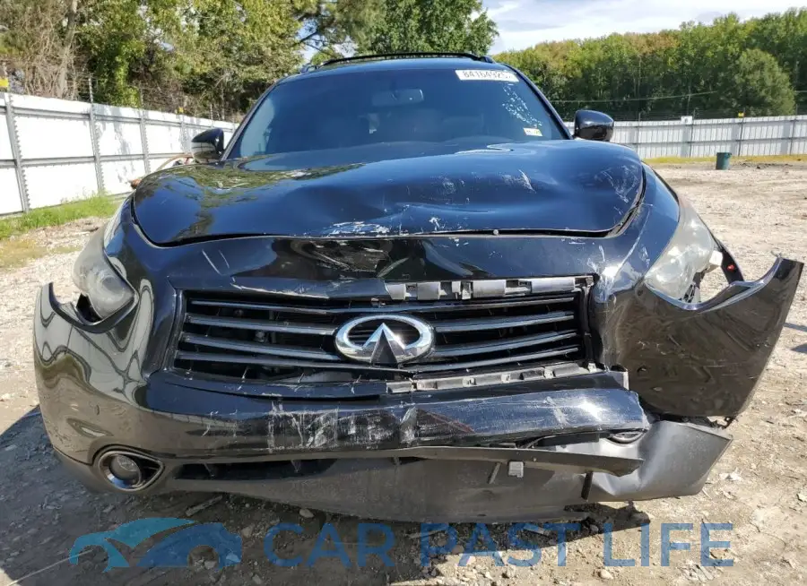 JN8CS1MW2GM750809# 5
