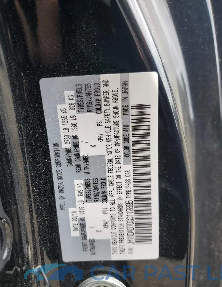 JM1NDAD70G0112895# 12