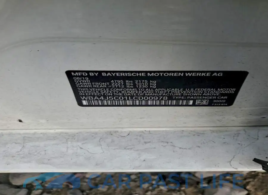 WBA4J5C01LCD00978# 13