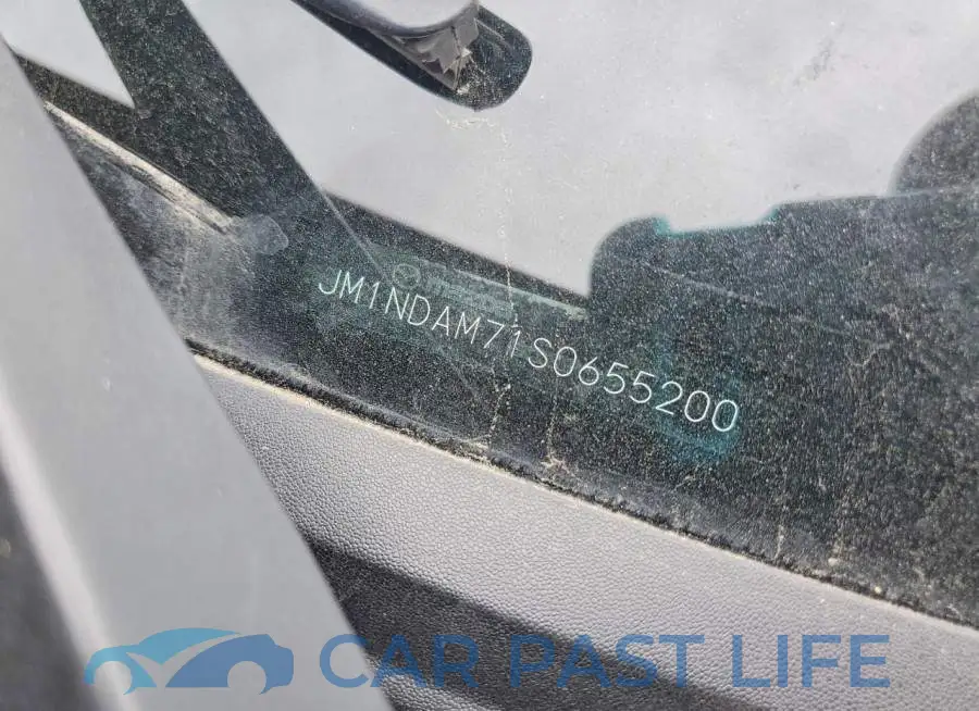 JM1NDAM71S0655200# 12